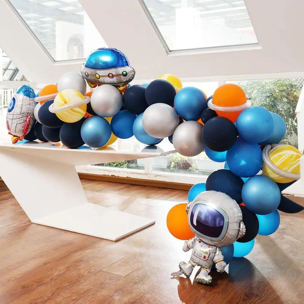 YOUMIKA   -  Outer Universe Space Planets Party Balloon Garland Kit Included UFO Rocket Astronaut Balloons for Kids Birthday Party Decoration