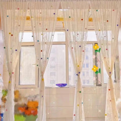 YOUMIKA  -  Rainbow Pom Pom Curtains Light Filtering Rod Pocket Bohemian Voile Window Drapes for Living Room Bedroom Nursery Girls Kids Room